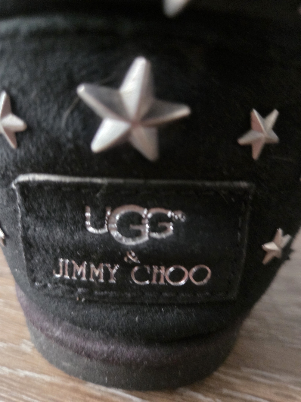 Jimmy Choo X UGG Women’s Black Star-Studded Slip-On Bootie.